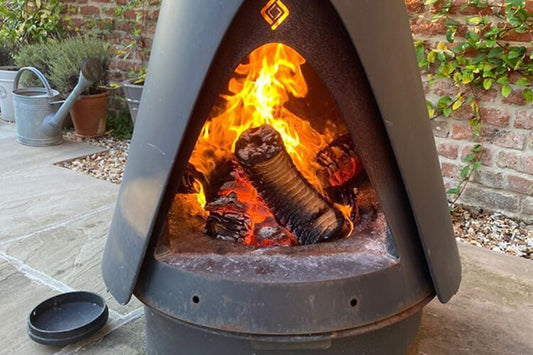 Cast Iron Chiminea With Lekto Hardwood Heat Logs inside
