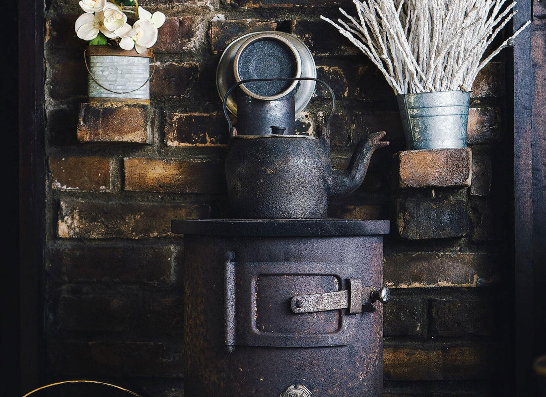 Outdoor log burner next to a wonderfully decorated patio area
