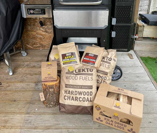 Lekto BBQ Fuels in front of Masterbuilt BBQ